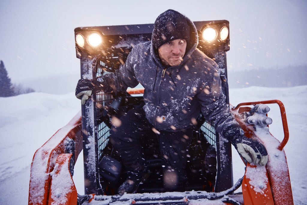 The roll up windshield makes entering and exiting the Kubota Skid steer fast and easy.