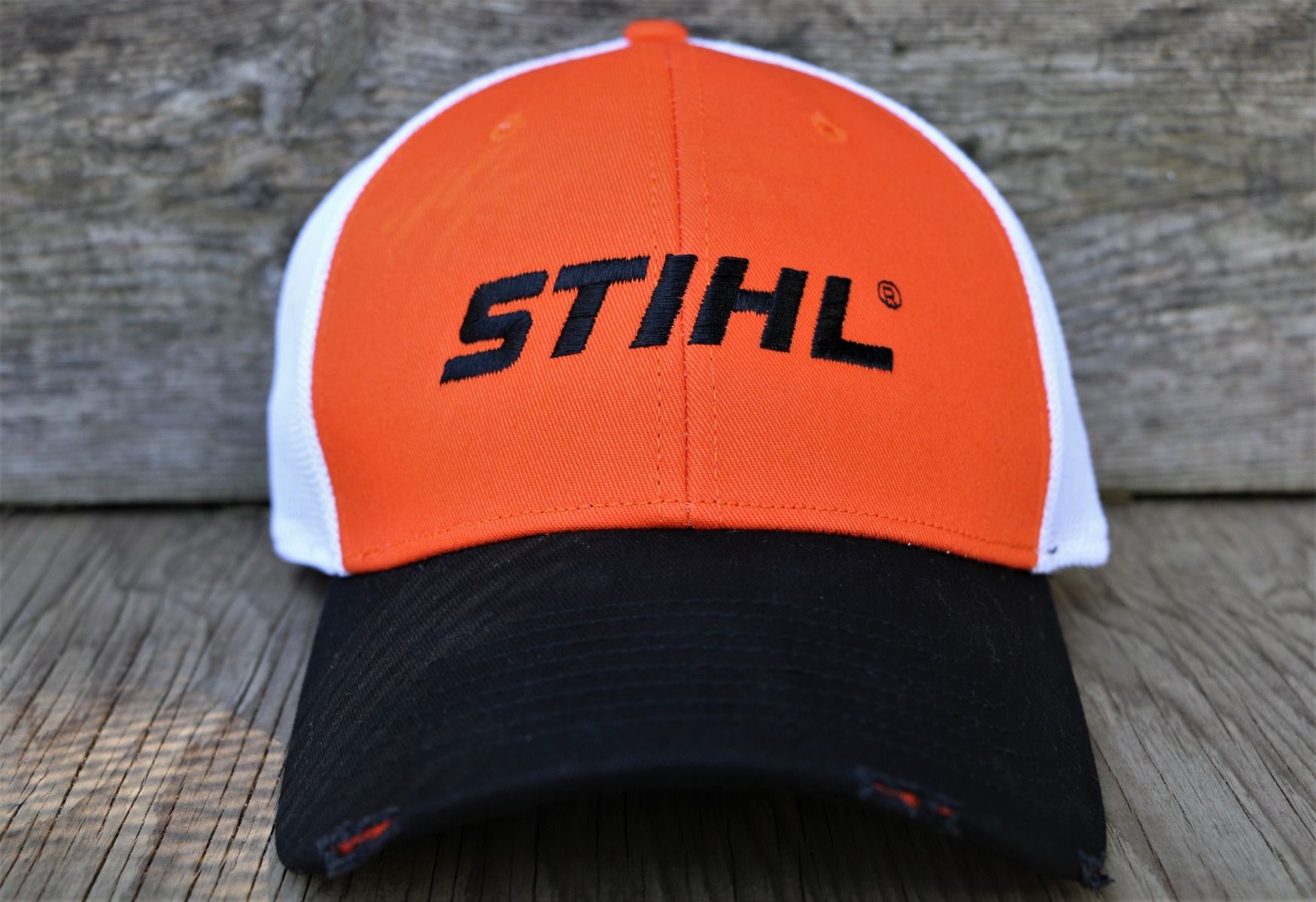 STIHL NEW ERA 39Thirty Distressed hat. Available in sizes M/L and L/XL